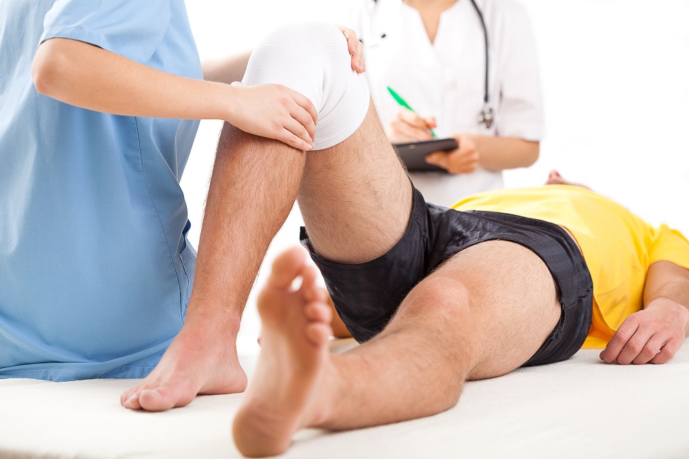 Sports injury chiropractic evaluation at Ryan Chiropractic Wellness Georgetown MA